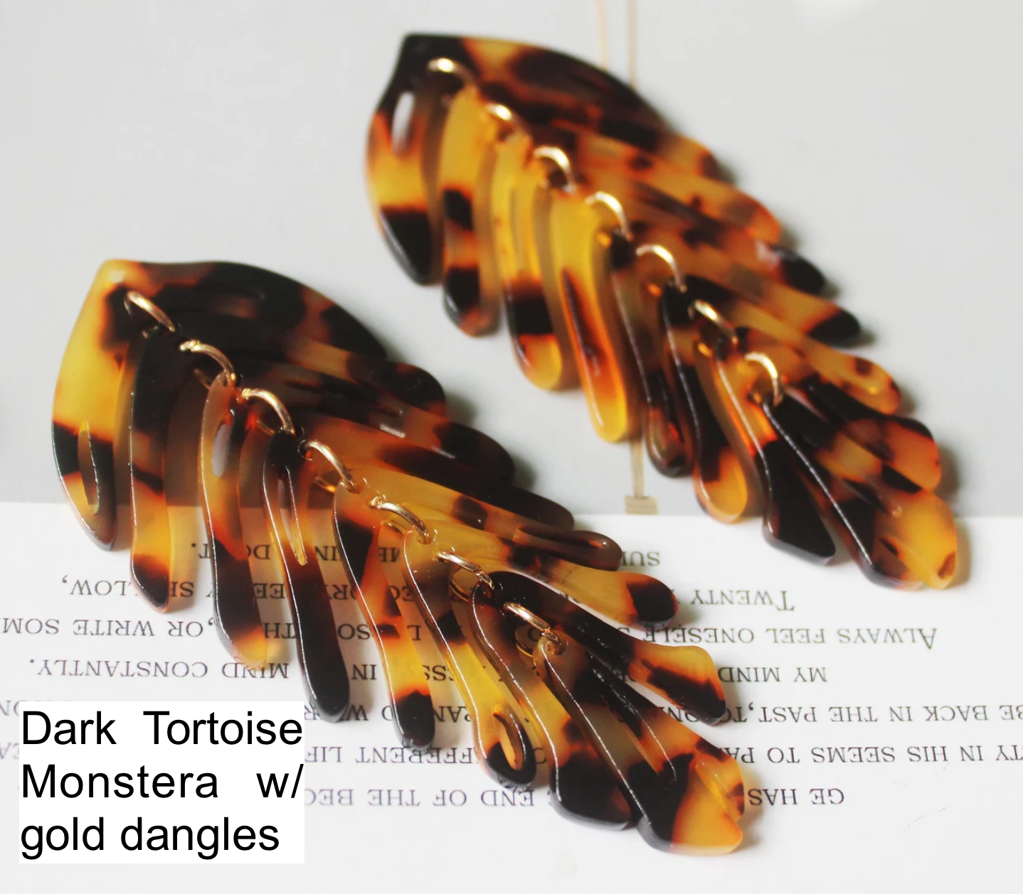 Tortoise shell segmented resin monstera earrings in 10 possible colors