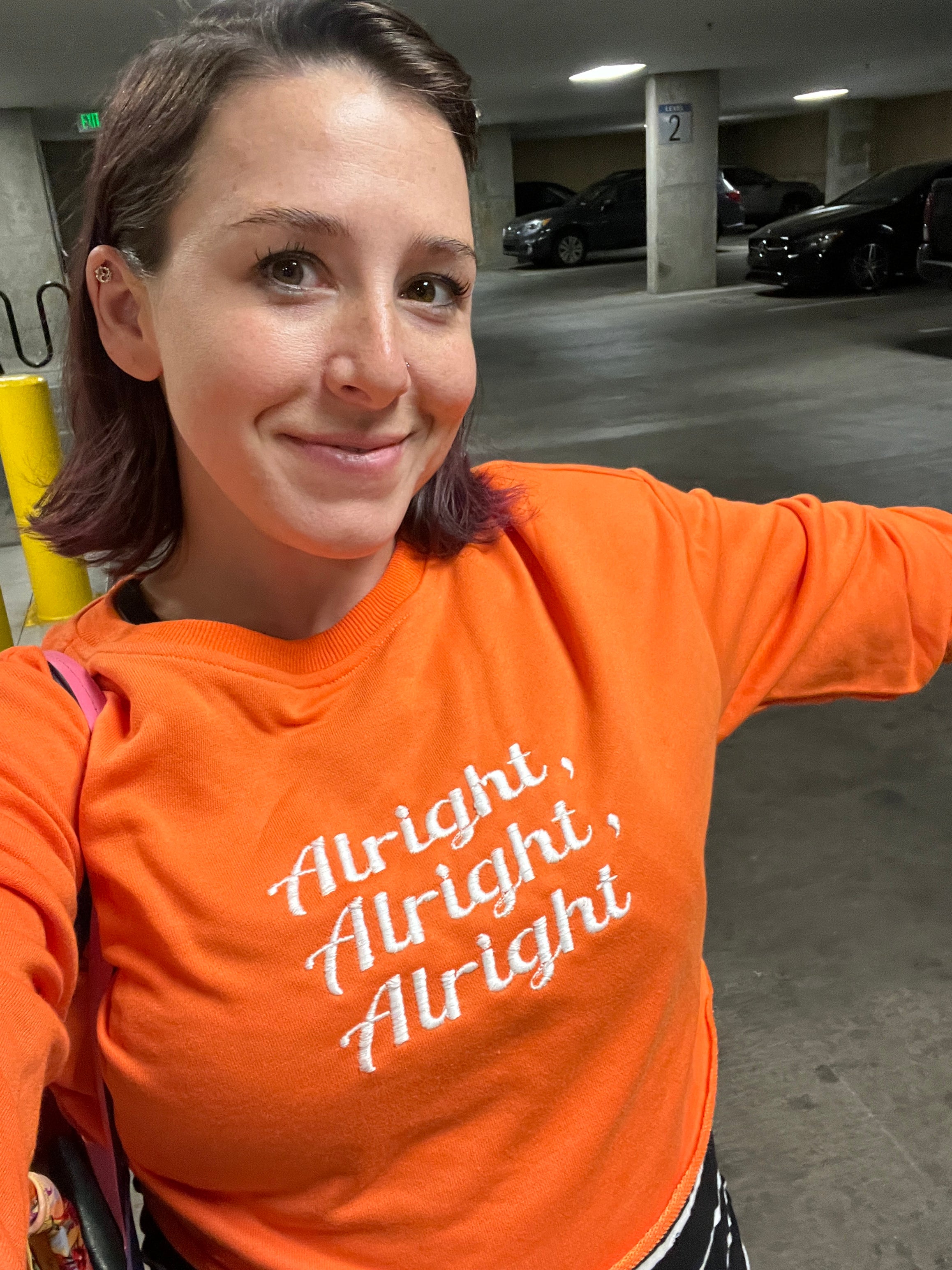 Customizable "Alright Alright Alright" cropped sweatshirt (women's)