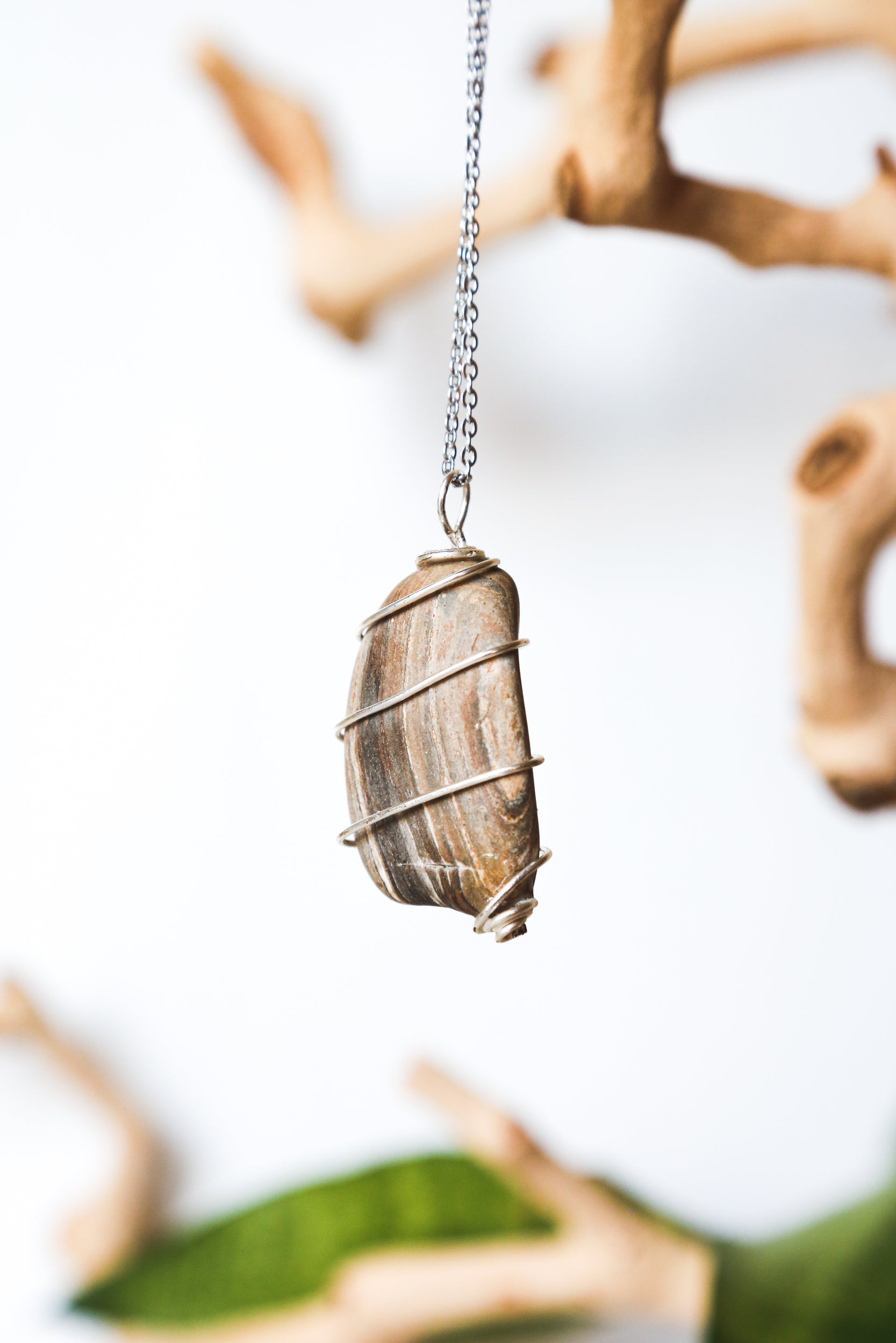 Wire-wrapped layered stone on stainless steel chain necklace