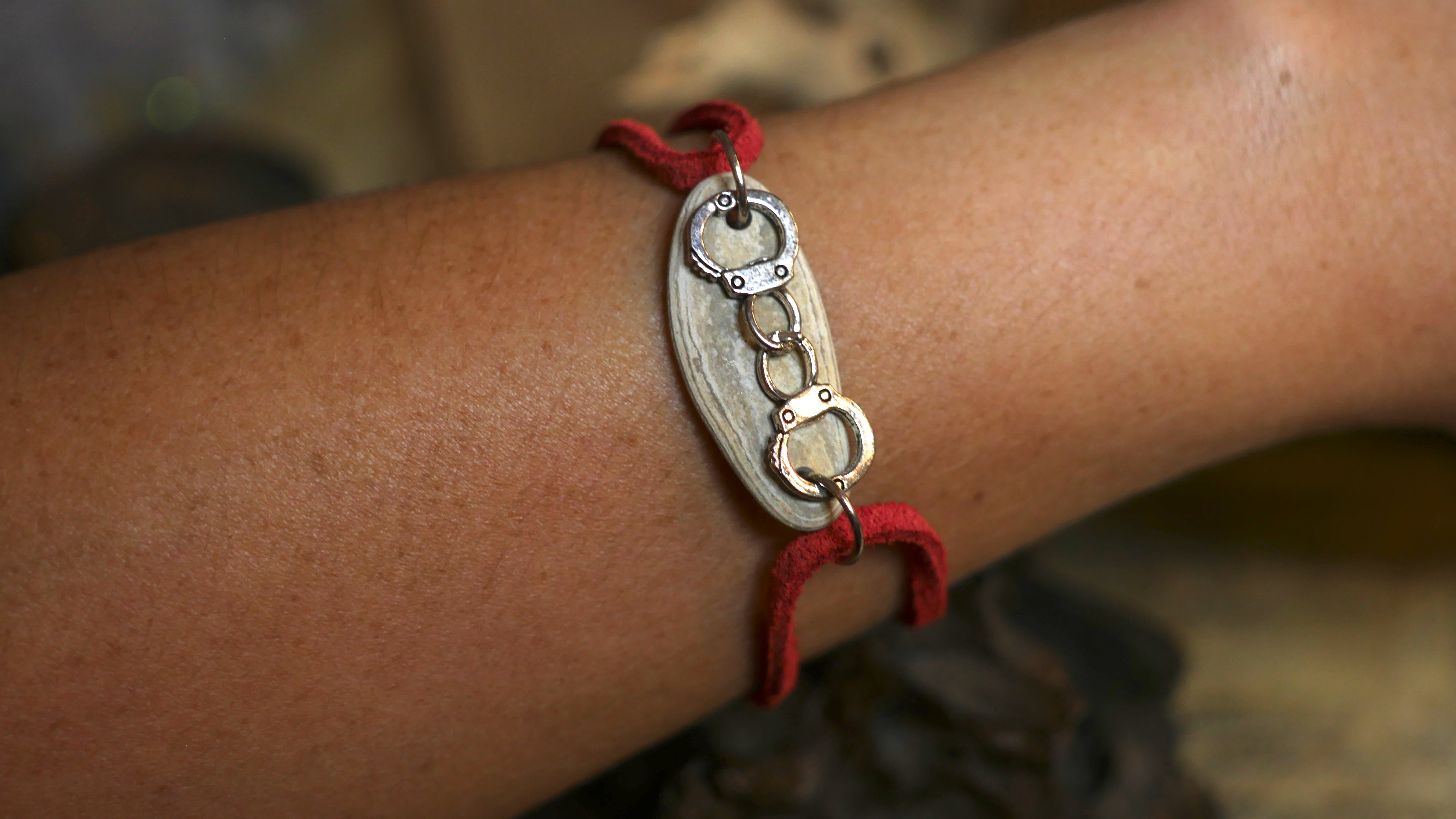 Double loop real red suede bracelet with handcuff charm
