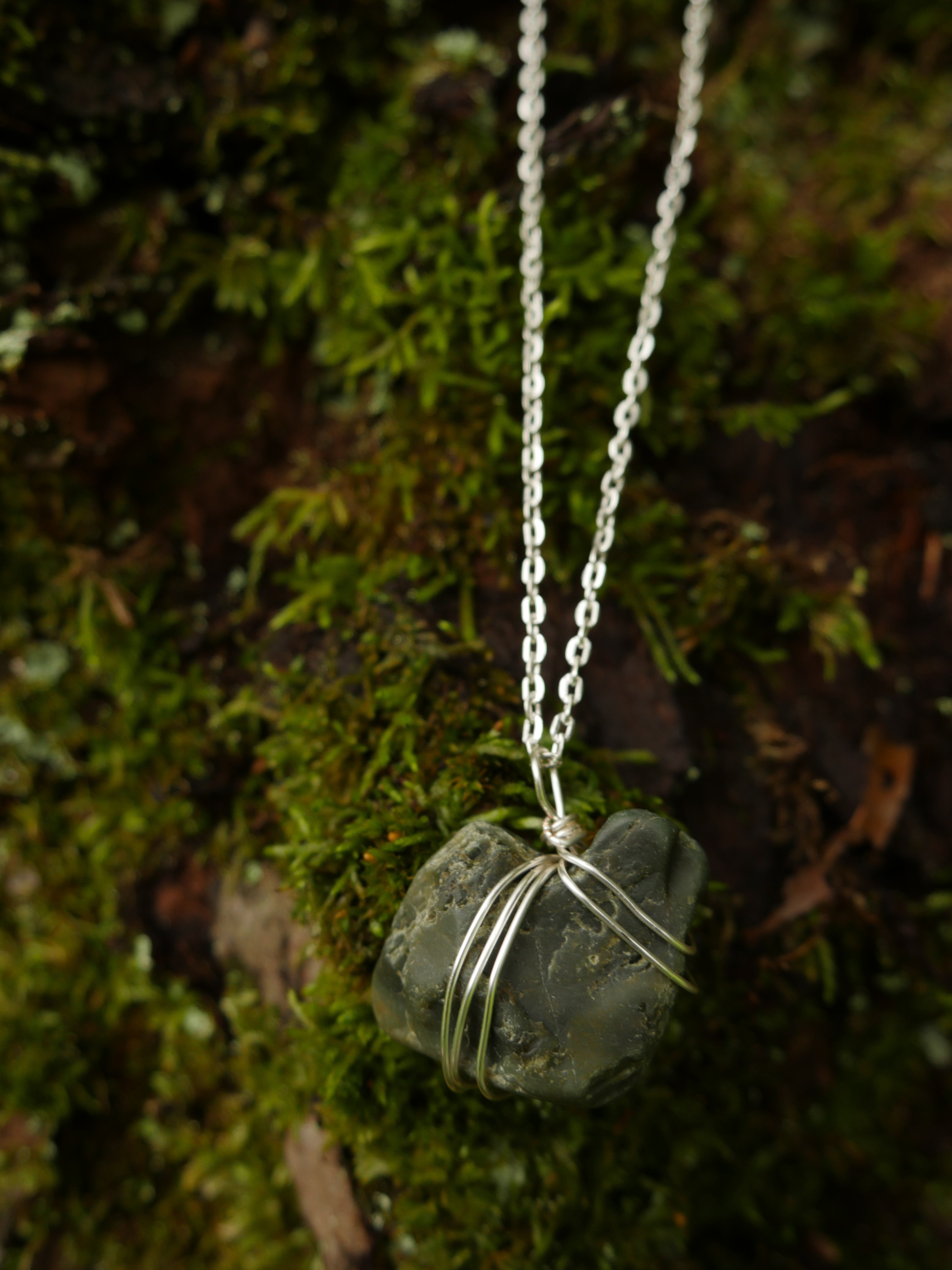 Greenish wire-wrapped stone on stainless steel chain necklace