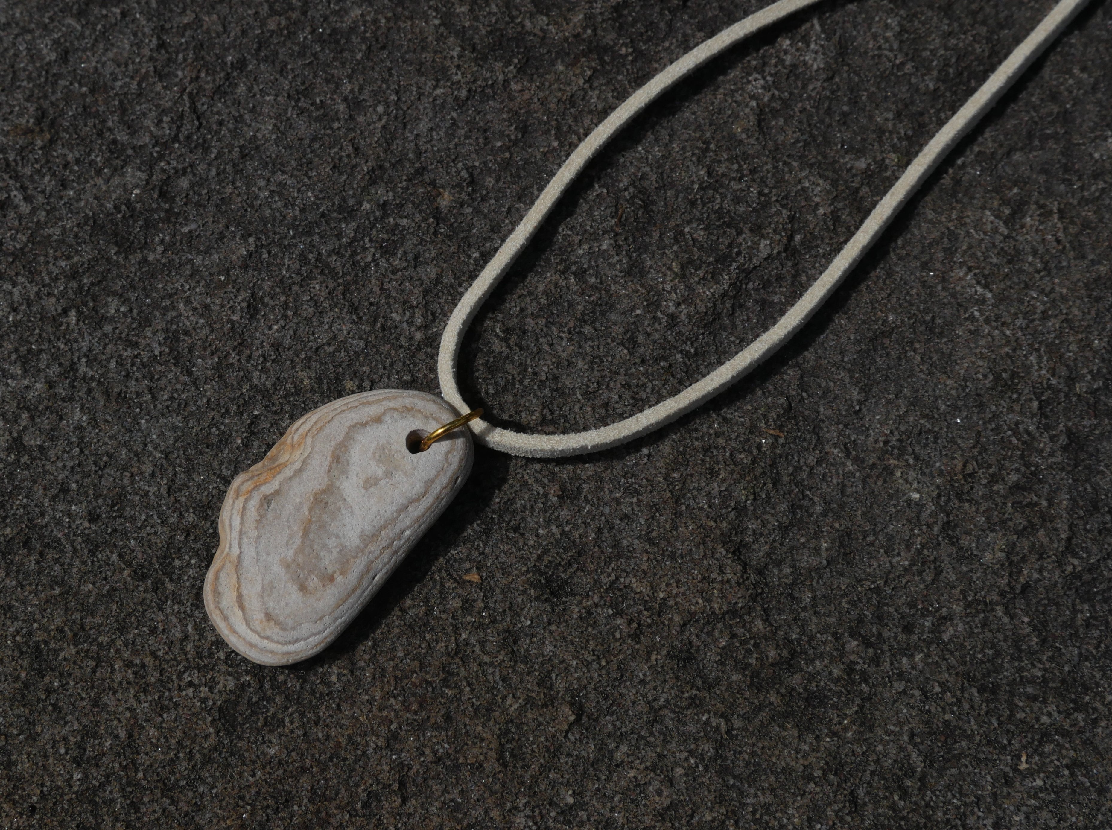 White and grey stone on cream faux suede necklace