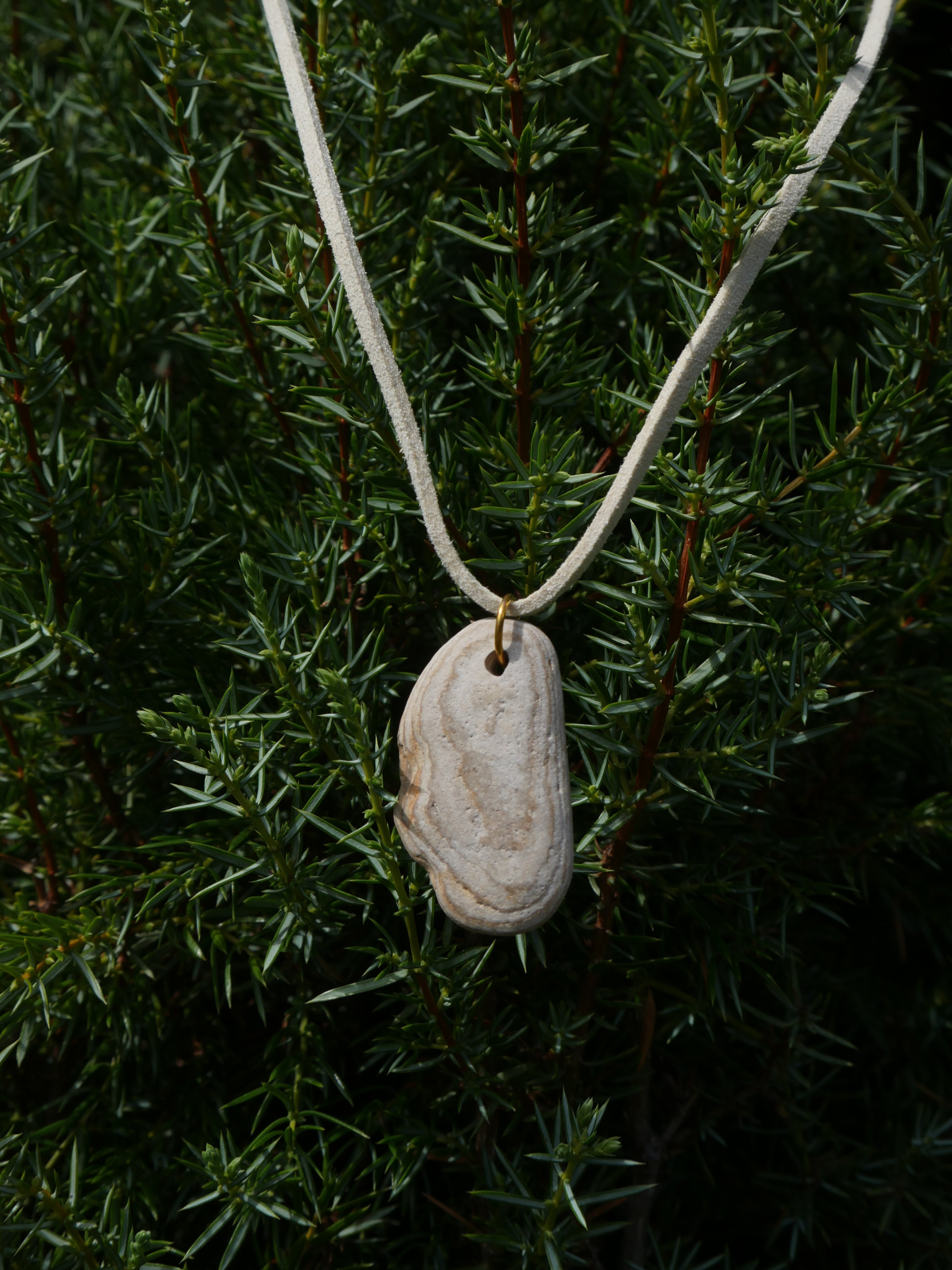 White and grey stone on cream faux suede necklace